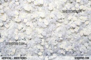 artificial white flowers used for photo booth background